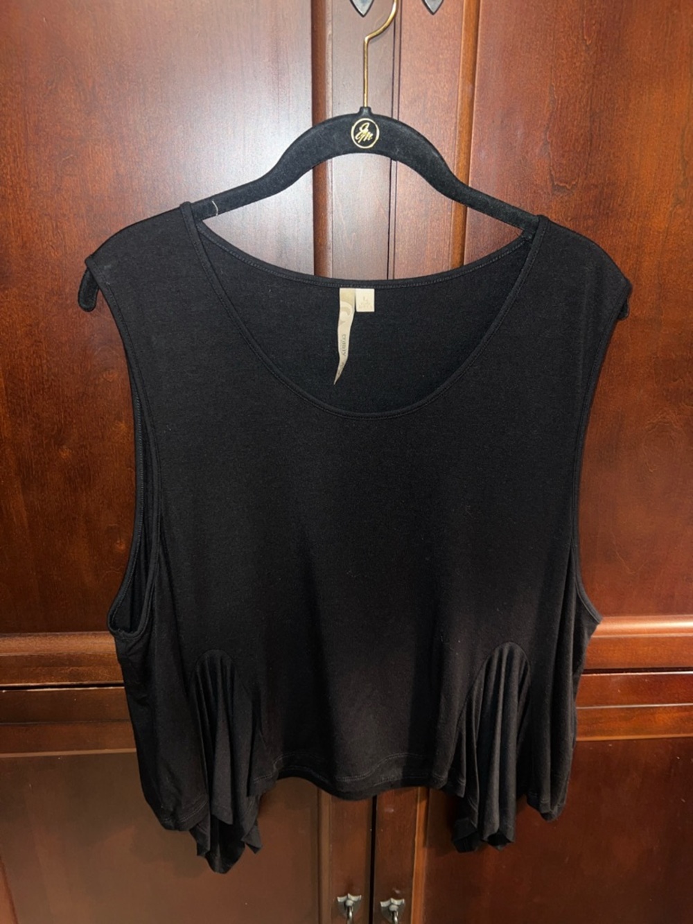 Comfy Black Women's Sleeveless Top with asymmetrical silhouette
